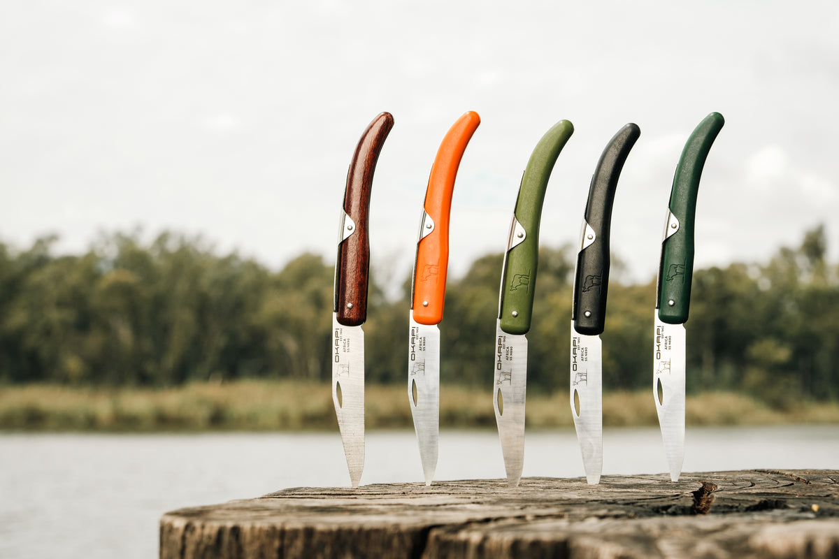 Close-up Okapi pocket knives in multiple colour options