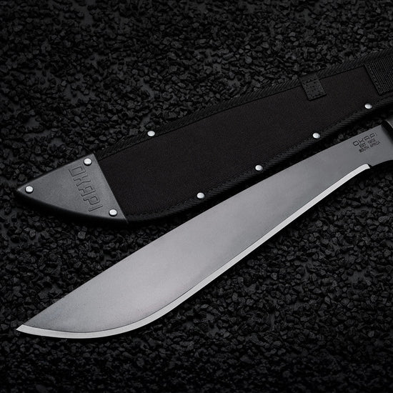 Okapi Jungle Machete Sheath in black on black stone background