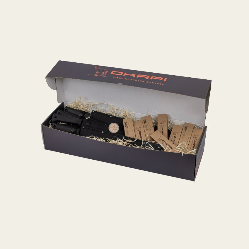 Okapi Full Range Knife Box – curated set of heritage folding knives and machetes in sleek black packaging