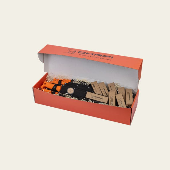 Okapi Full Range Knife Box – Orange Edition featuring South African-made folding and bush knives